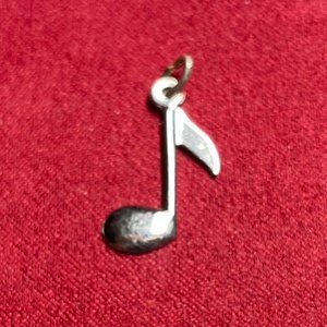 Vintage Wells, Inc. Sterling Silver Musical Note Charm.